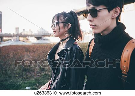 Stock Image - Trendy young couple, Milan, Italy. Fotosearch