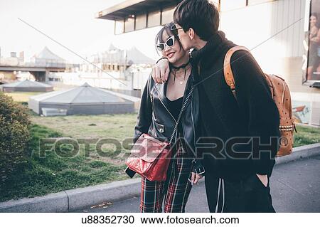 Stock Image - Trendy young couple, Milan, Italy. Fotosearch