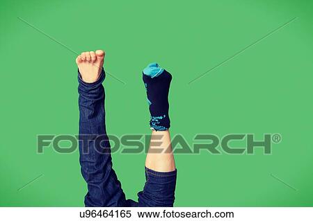 Trying to put on trousers upside down View Large Photo Image Stock Photography - Trying to put on trousers upside down. Fotosearch