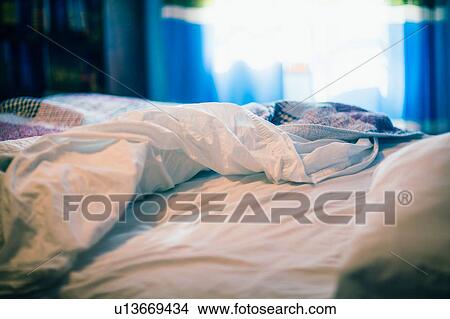 Picture - Unmade bed. Fotosearch