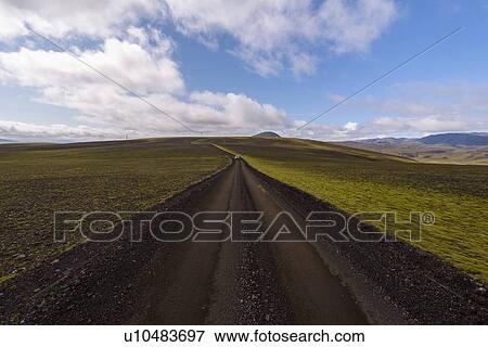 Stock Photo - Vehicle on road in mossy landscape, Landmannalaugar, Highlands, Iceland. Fotosearch