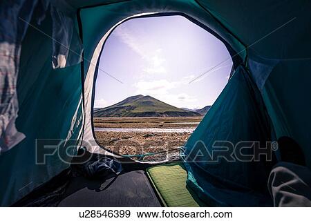 Stock Photo - View of volcano from inside tent, Landmannalaugar, Iceland. Fotosearch