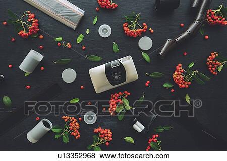 Stock Photo - Vintage camera and film. Fotosearch