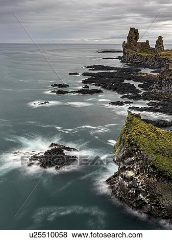 Volcanic rock formations, black sand beach, Snaefellsbaer, Vesturland, Iceland View Large Photo Image Stock Photo - Volcanic rock formations, black sand beach, Snaefellsbaer, Vesturland, Iceland. Fotosearch