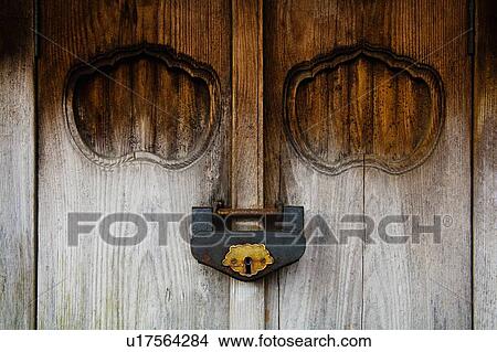 Weathered Wood Door and Old Lock View Large Photo Image Picture - Weathered Wood Door and Old Lock. Fotosearch