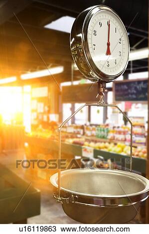 Weighing scales in supermarket with lens flare View Large Photo Image Stock Image - Weighing scales in supermarket with lens flare. Fotosearch