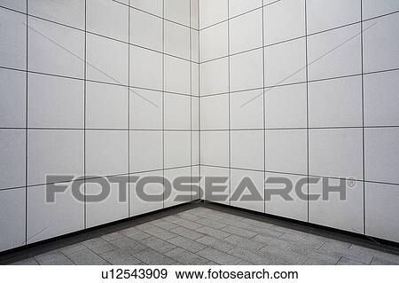 Stock Photo - White tile wall in Metro station. Fotosearch