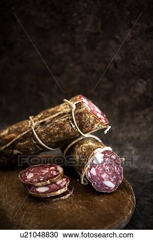 Whole salami, cut and sliced View Large Photo Image Stock Image - Whole salami, cut and sliced. Fotosearch