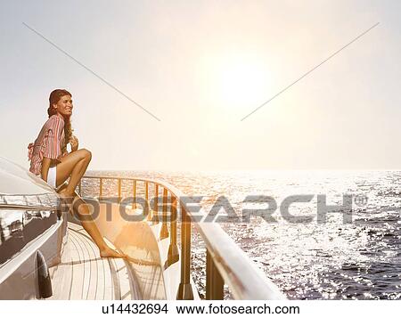 Picture - Woman on Deck of Boat. Fotosearch