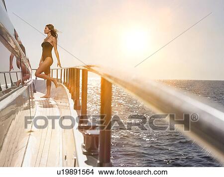 Woman on Deck of Boat View Large Photo Image Picture - Woman on Deck of Boat. Fotosearch