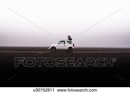Woman photographing from top of off road vehicle, Landmannalaugar, Iceland View Large Photo Image Stock Image - Woman photographing from top of off road vehicle, Landmannalaugar, Iceland. Fotosearch