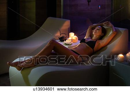Stock Image - Woman relaxing in spa. Fotosearch