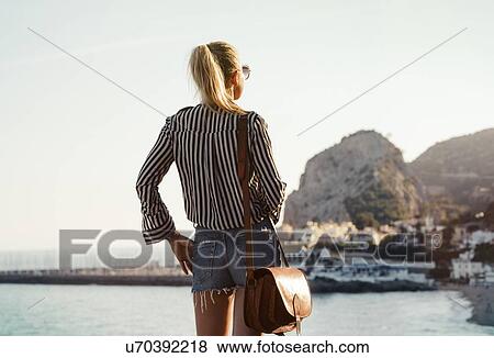 Woman traveller exploring island, Garraf, Spain View Large Photo Image Stock Photo - Woman traveller exploring island, Garraf, Spain. Fotosearch