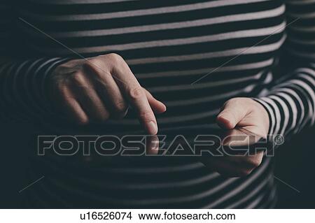 Picture - Woman using tablet computer. Fotosearch