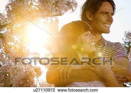 Young Couple in summertime View Large Photo Image Stock Image - Young Couple in summertime. Fotosearch