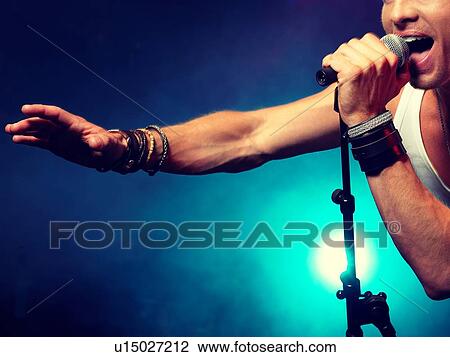 Young Man Singing at rock Concert View Large Photo Image Stock Image - Young Man Singing at rock Concert. Fotosearch