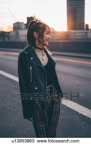 Young woman dressed in punk style, Milan, Italy View Large Photo Image Stock Image - Young woman dressed in punk style, Milan, Italy. Fotosearch