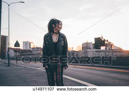 Young woman dressed in punk style, Milan, Italy View Large Photo Image Stock Photo - Young woman dressed in punk style, Milan, Italy. Fotosearch