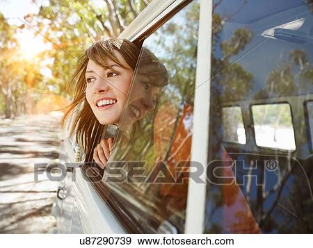 Young Woman Leaning out of Van Window View Large Photo Image Stock Photo - Young Woman Leaning out of Van Window. Fotosearch