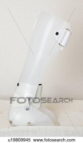 Stock Photography - Artificial limb over gray background. Fotosearch