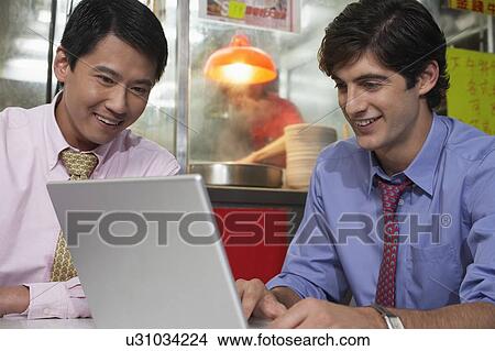 Picture - Asian business. Fotosearch