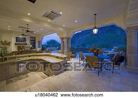 Bar counter with seating furniture in patio of luxury mansion View Large Photo Image Stock Image - Bar counter with seating furniture in patio of luxury mansion. Fotosearch
