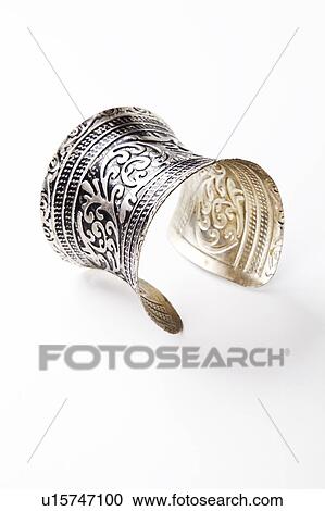 Stock Image - Beautiful design on bracelet over white background. Fotosearch