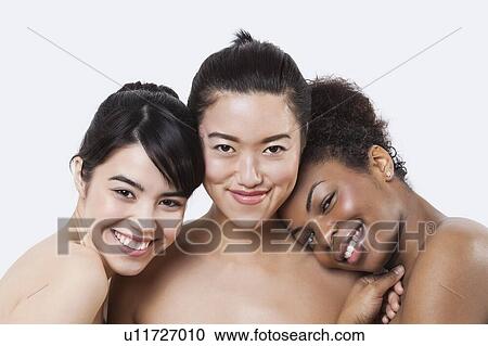 Beauty portrait of happy young multi-ethnic women over white background View Large Photo Image Stock Image - Beauty portrait of happy young multi-ethnic women over white background. Fotosearch