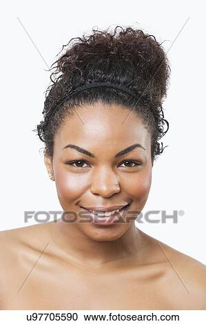 Beauty portrait of smiling young African American woman over white background View Large Photo Image Stock Image - Beauty portrait of smiling young African American woman over white background. Fotosearch