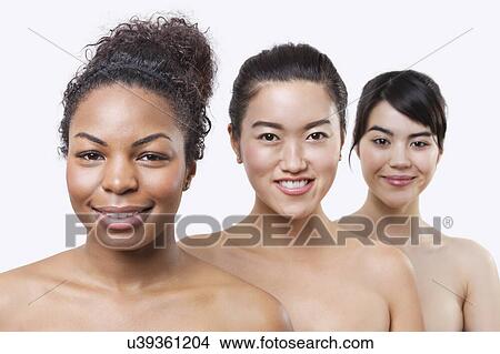 Beauty portrait of young multi-ethnic women over white background View Large Photo Image Picture - Beauty portrait of young multi-ethnic women over white background. Fotosearch