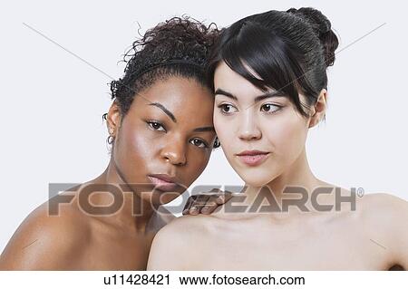 Beauty portrait of young multi-ethnic women over white background View Large Photo Image Stock Image - Beauty portrait of young multi-ethnic women over white background. Fotosearch