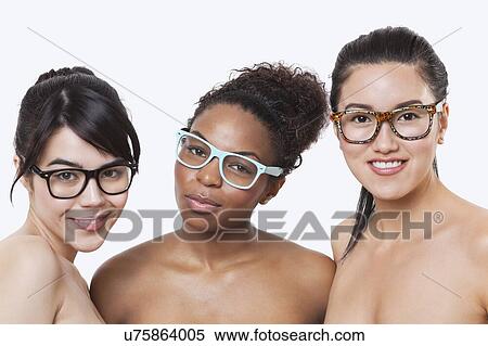 Stock Photography - Beauty portrait of young multi-ethnic women wearing glasses over white background. Fotosearch