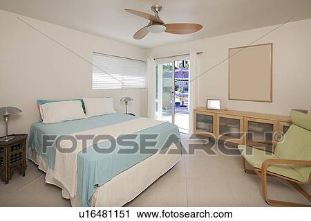 Bedroom interior with sliding door to garden View Large Photo Image Stock Image - Bedroom interior with sliding door to garden. Fotosearch