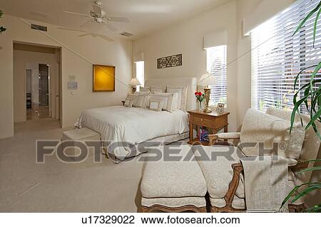 Stock Image - Bedroom of luxury villa. Fotosearch