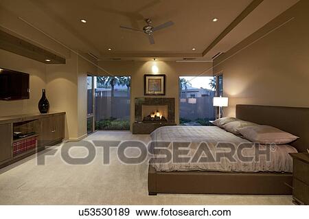 Stock Photo - Bedroom with big window in manor house. Fotosearch