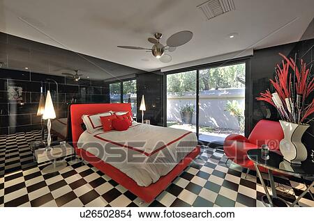 Picture - Bedroom with checked pattern in modern mansion. Fotosearch