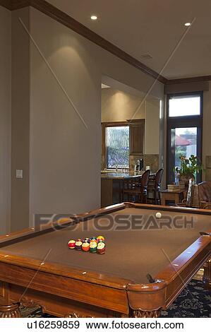 Billiard table leading onto dining area View Large Photo Image Stock Photo - Billiard table leading onto dining area. Fotosearch