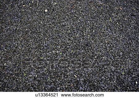 Black wet gravel View Large Photo Image Stock Image - Black wet gravel. Fotosearch