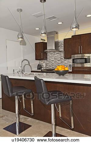 Breakfast bar in modern kitchen View Large Photo Image Stock Image - Breakfast bar in modern kitchen. Fotosearch