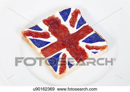 Stock Photo - British flag represented on bread over white background. Fotosearch