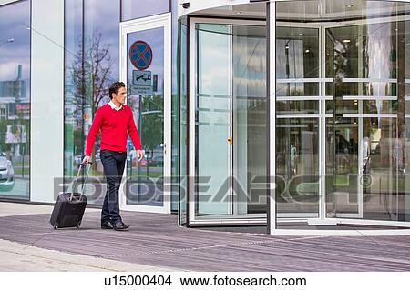 Picture - Businessman attending business conference in a hotel. Fotosearch