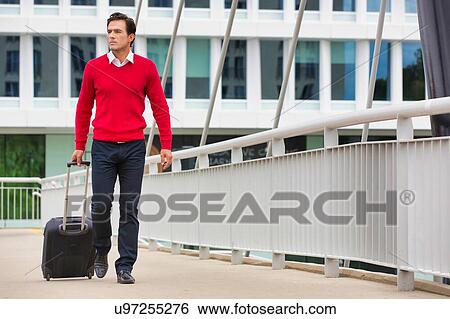 Stock Photograph - Businessman attending business conference in a hotel. Fotosearch