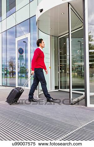 Stock Photography - Businessman attending business conference in a hotel. Fotosearch