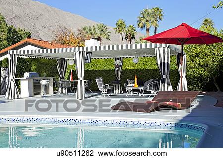 Cabana at poolside in luxury mansion View Large Photo Image Stock Image - Cabana at poolside in luxury mansion. Fotosearch