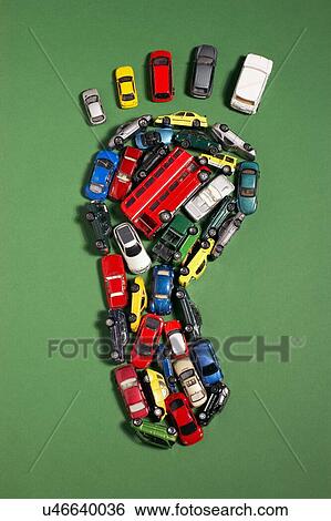 Stock Photograph - Carbon footprint of toy cars. Fotosearch