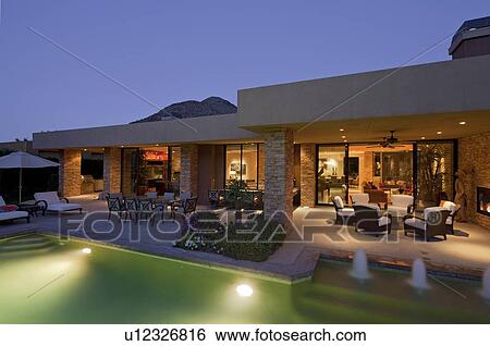 Chaise lounge with swimming pool in luxury mansion View Large Photo Image Stock Photograph - Chaise lounge with swimming pool in luxury mansion. Fotosearch