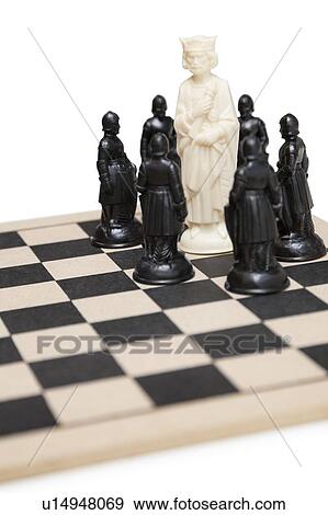 Chess game with king surrounded by black pawns View Large Photo Image Stock Photo - Chess game with king surrounded by black pawns. Fotosearch