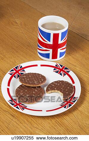 Chocolate biscuits in plate with British coffee mug View Large Photo Image Stock Photography - Chocolate biscuits in plate with British coffee mug. Fotosearch