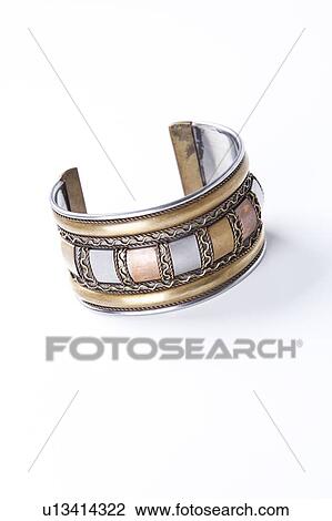 Close-up of a bracelet over white background View Large Photo Image Stock Image - Close-up of a bracelet over white background. Fotosearch