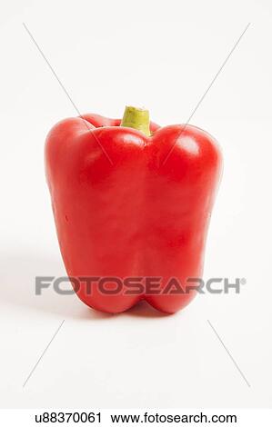 Stock Image - Close-up of red bell pepper over white background. Fotosearch